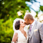 Bride and groom kiss during their Promontory Point wedding