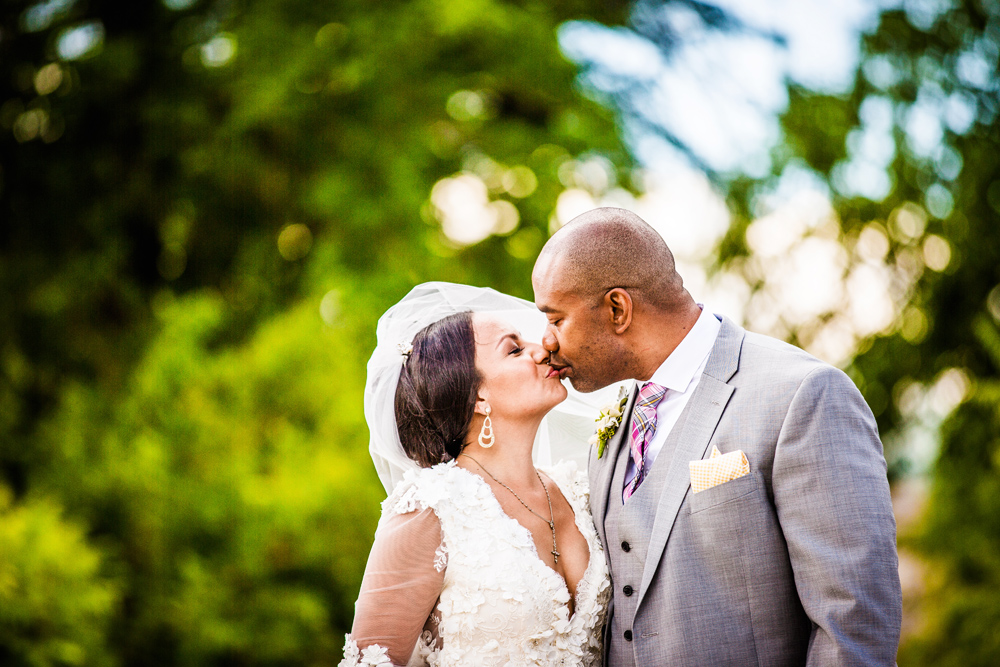 Bride and groom kiss during their Promontory Point wedding