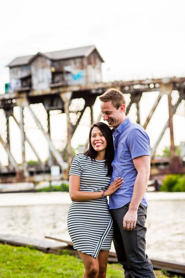 Couple jokes around together during their Ping Tom Park engagement session