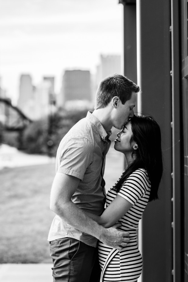 A couple kisses during their Ping Tom Park engagement session