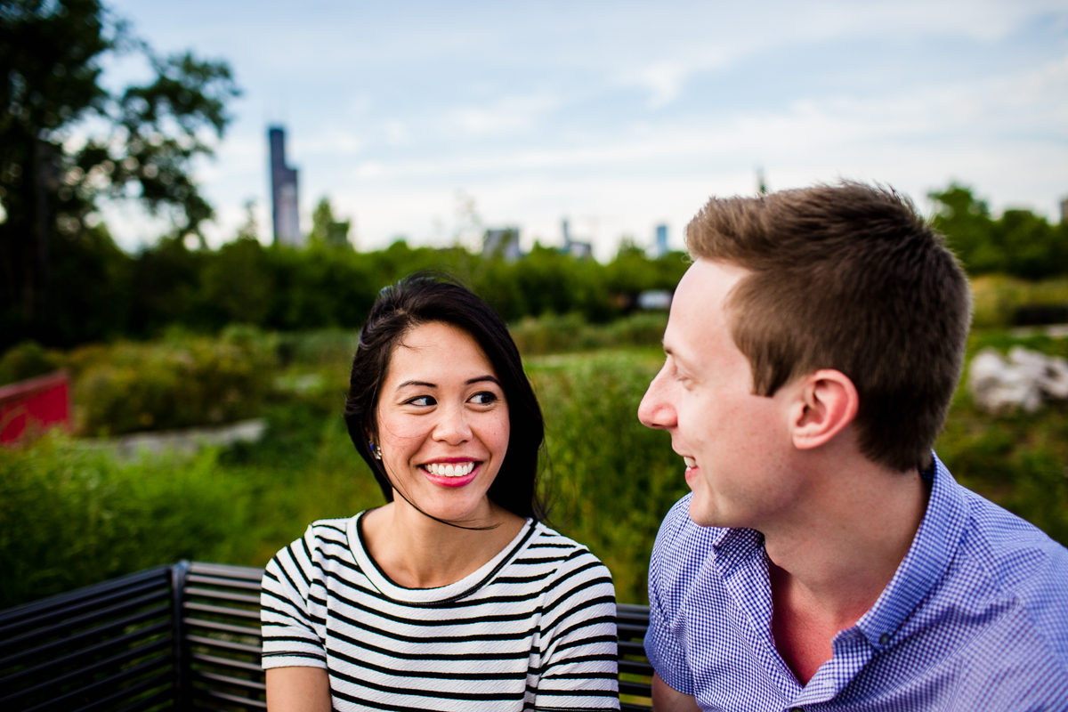 A couple jokes around together during their Ping Tom Park engagement session