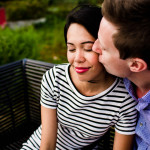 A couple kisses during their Ping Tom Park engagement session