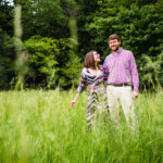 Couple jokes around together during their Des Plaines River engagement session.