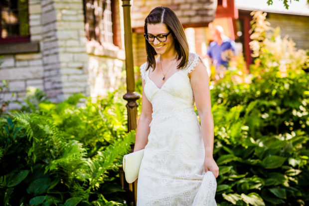 Bride walks to meet her soon-to-be husband before her wedding at The Grove.