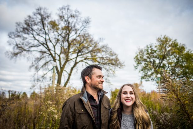 Couple laughs together during their Lincoln Park engagement session.