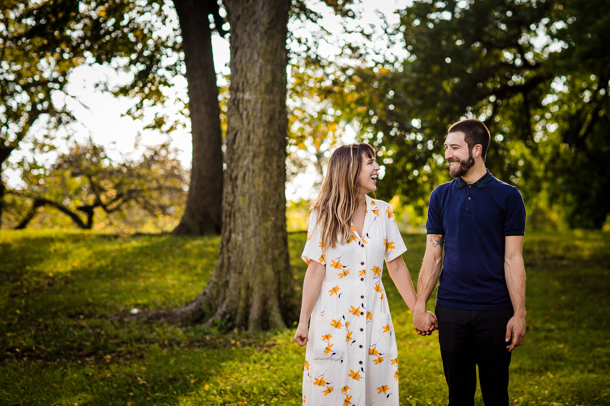 A couple holds hands during their Humboldt Park engagement session in Chicago.