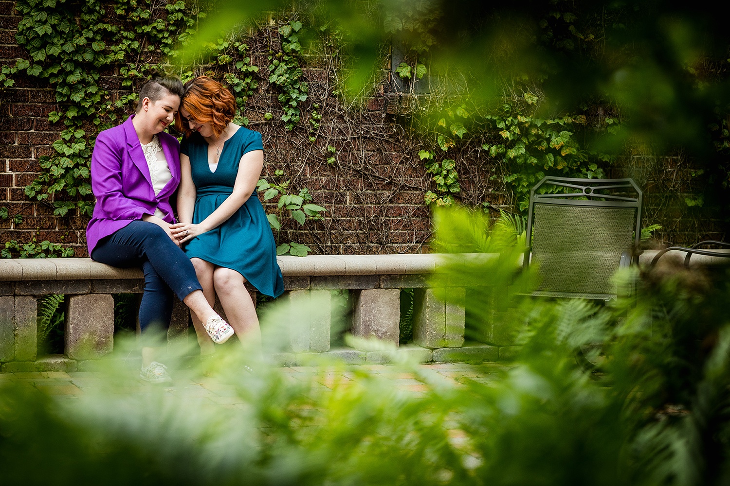 A couple holds hands during their Andersonville engagement session. 
