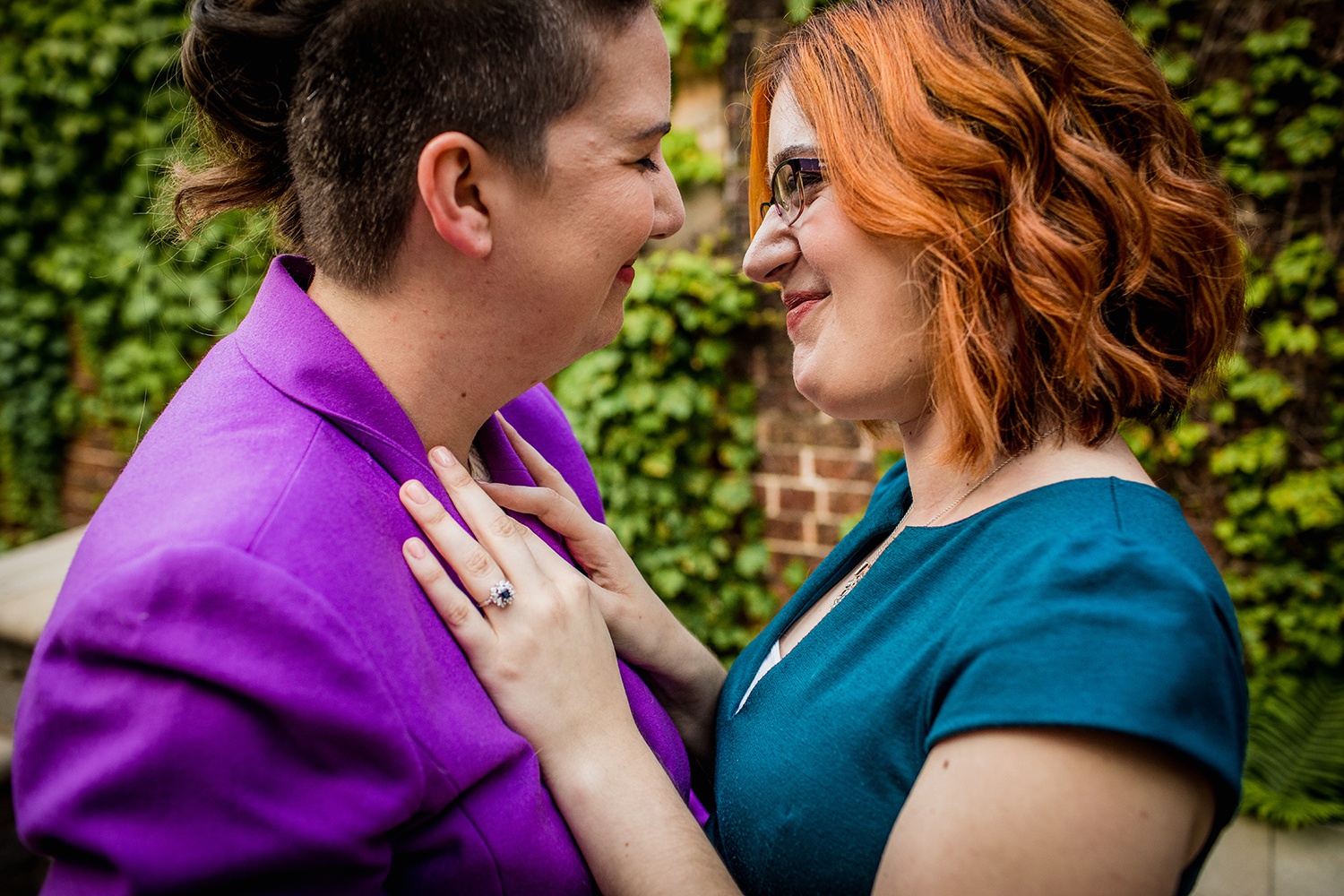A couple laughs together during their Andersonville engagement session. 