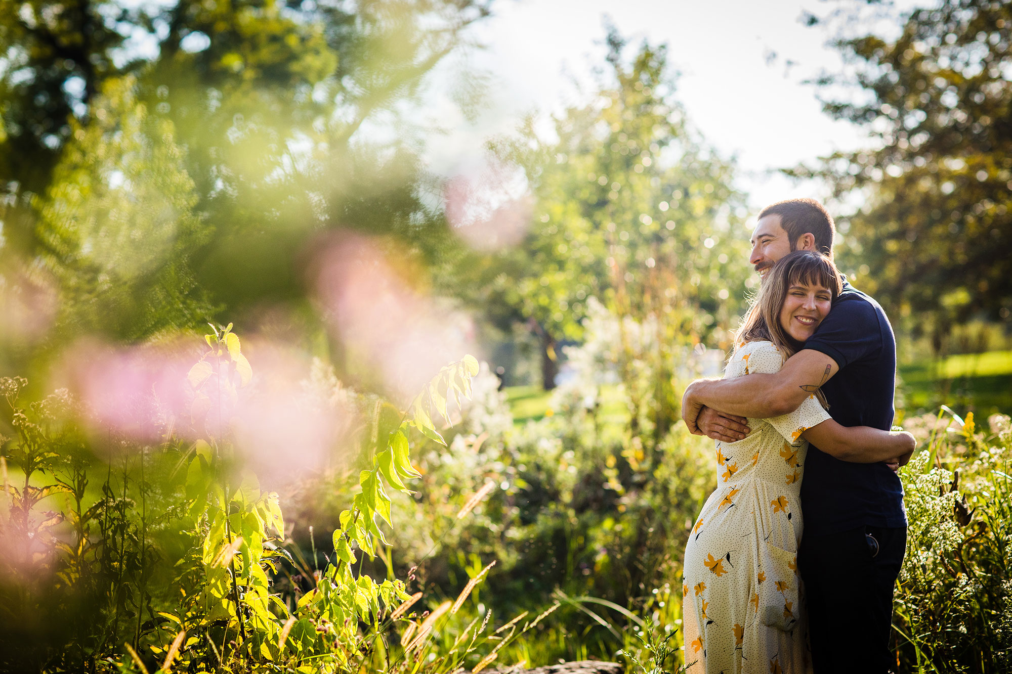 A couple hugs each other during their Humboldt Park engagement session in Chicago.