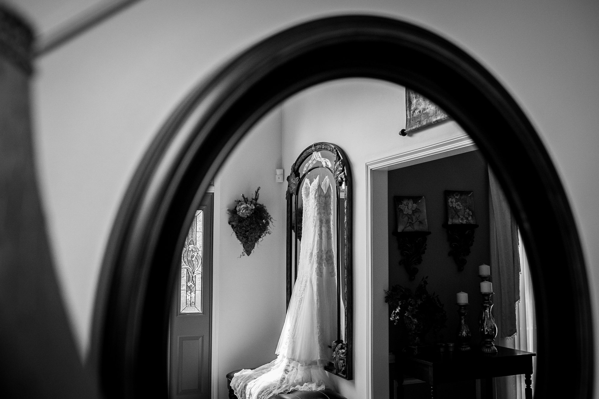 A wedding dress is reflected in a mirror before a Katherine Legge Memorial Lodge wedding.