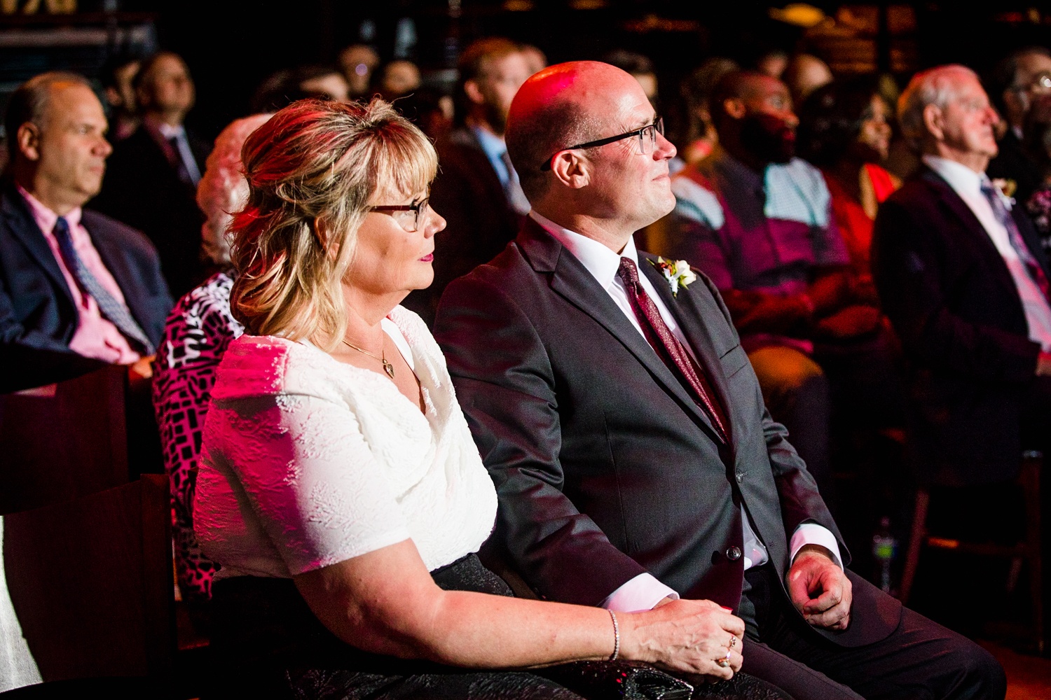 Guests watch a ceremony at a Mayne Stage wedding in Chicago. 