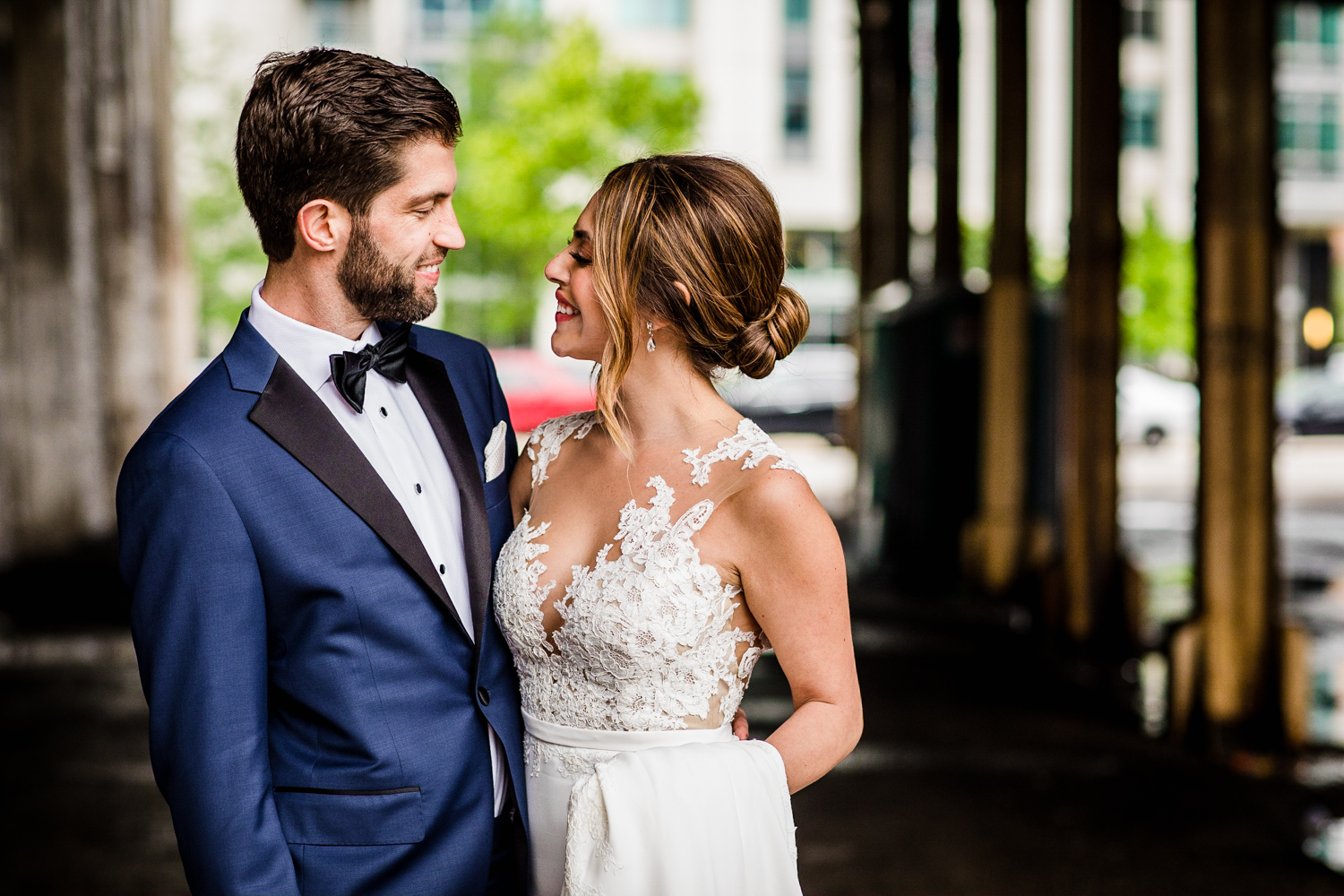 A bride and groom pose for a portrait before their Gallery Marchetti wedding.