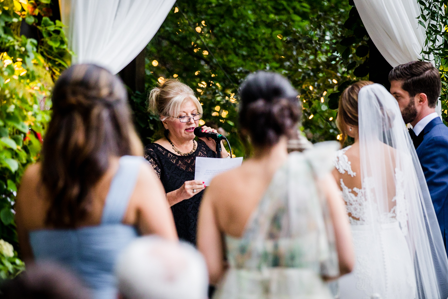 A guest gives a reading during a Gallery Marchetti wedding.