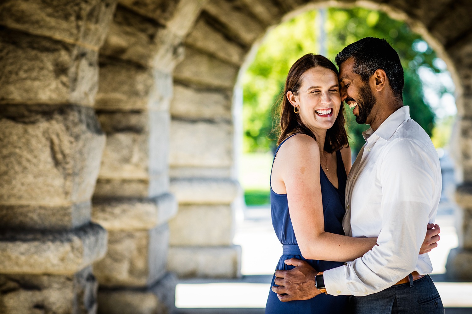 A couple laughs together during the Lincoln Park engagement session.