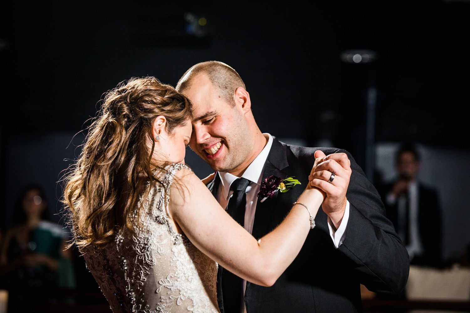 A couple shares their first dance at a Mayne Stage wedding in Chicago. 