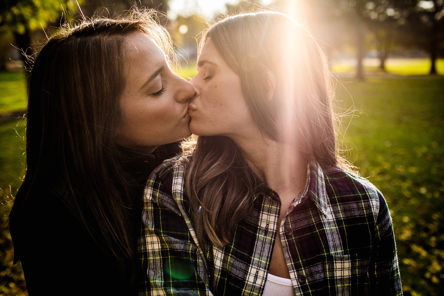A couple kisses during their Andersonville engagement session.