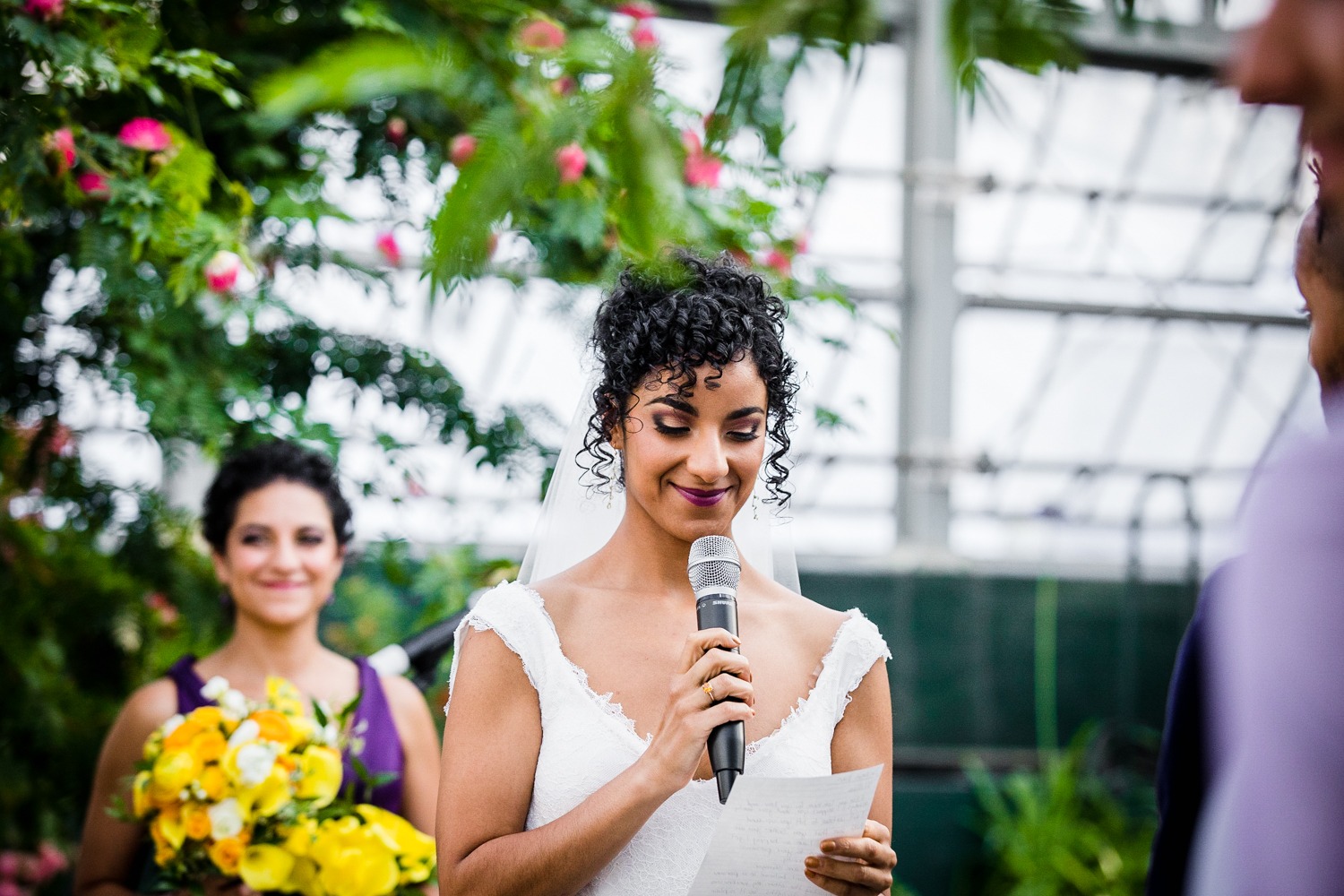 A bride recites her vows during a Garfield Park Conservatory wedding.