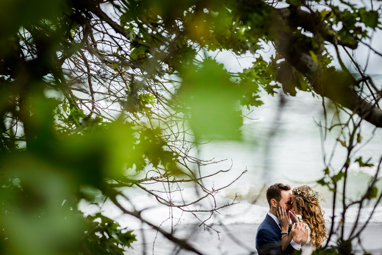 A couple shares a moment together along Lake Michigan at an Illinois Beach Resort wedding