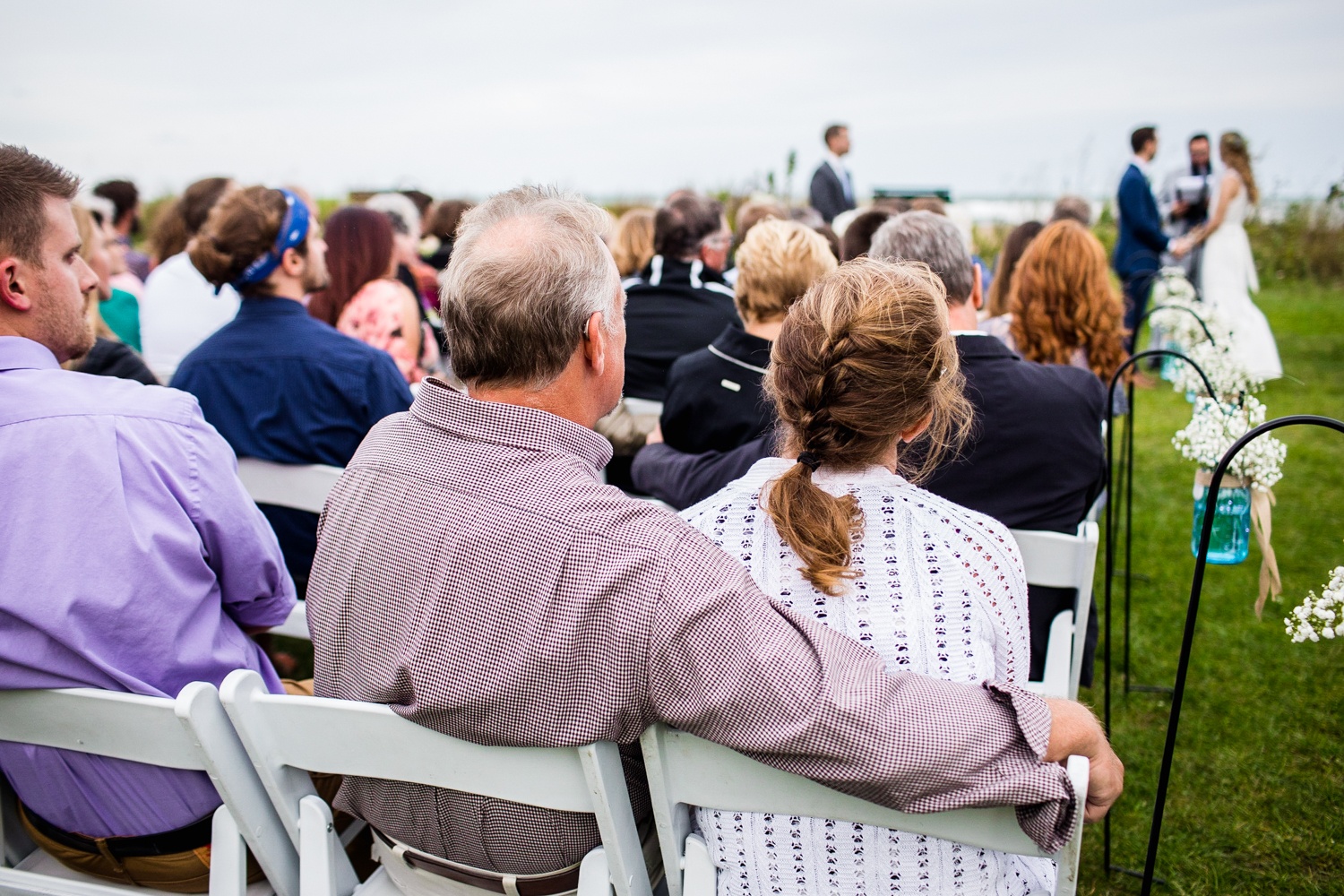 Guests watch a ceremony at an Illinois Beach Resort wedding