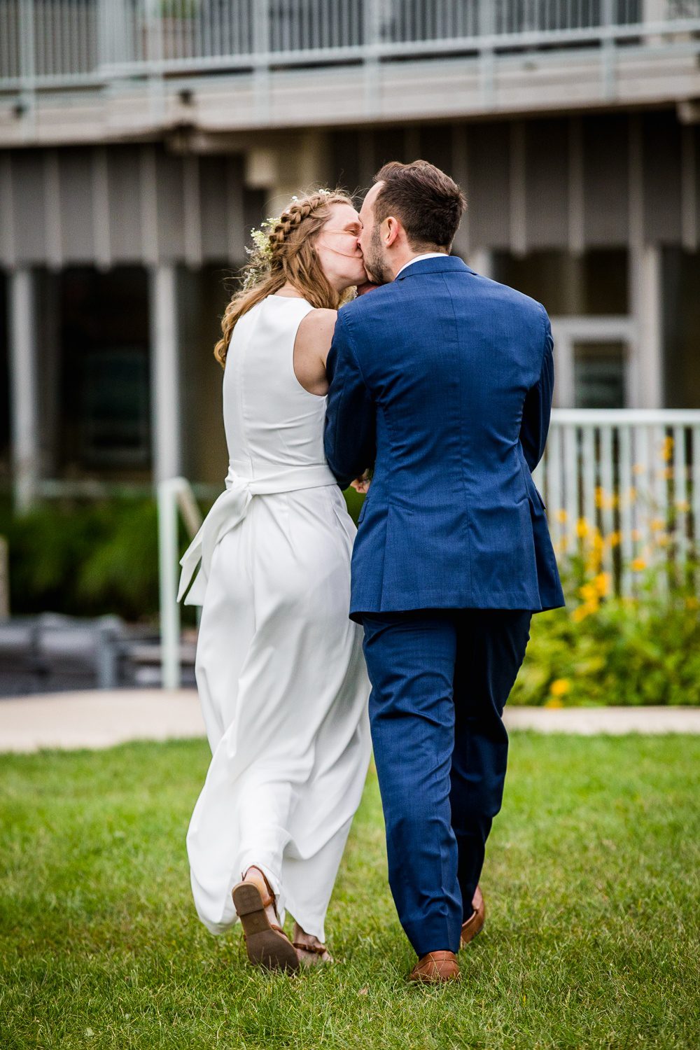 A couple shares a kiss after their ceremony at an Illinois Beach Resort wedding