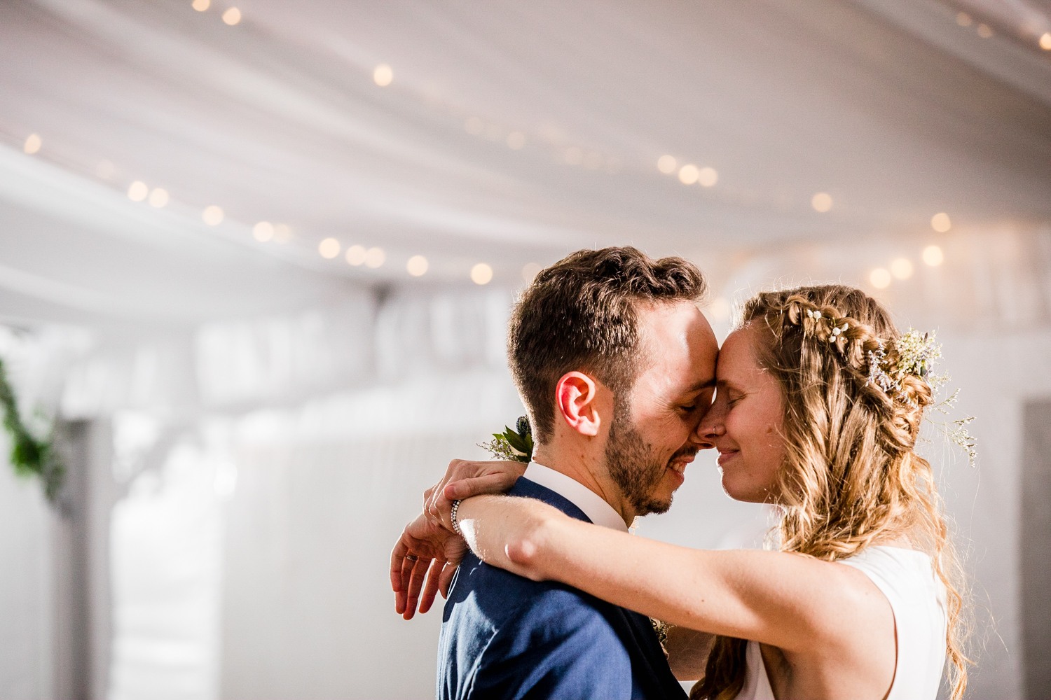 A couple shares their first dance an an Illinois Beach Resort wedding