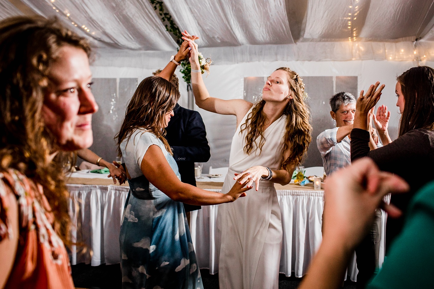 Guests dance with the bride at an Illinois Beach Resort wedding reception.