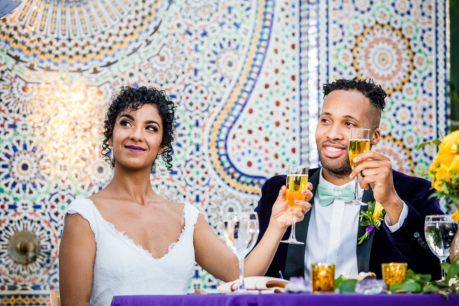 A couple listens to a toast at a Garfield Park Conservatory wedding. 