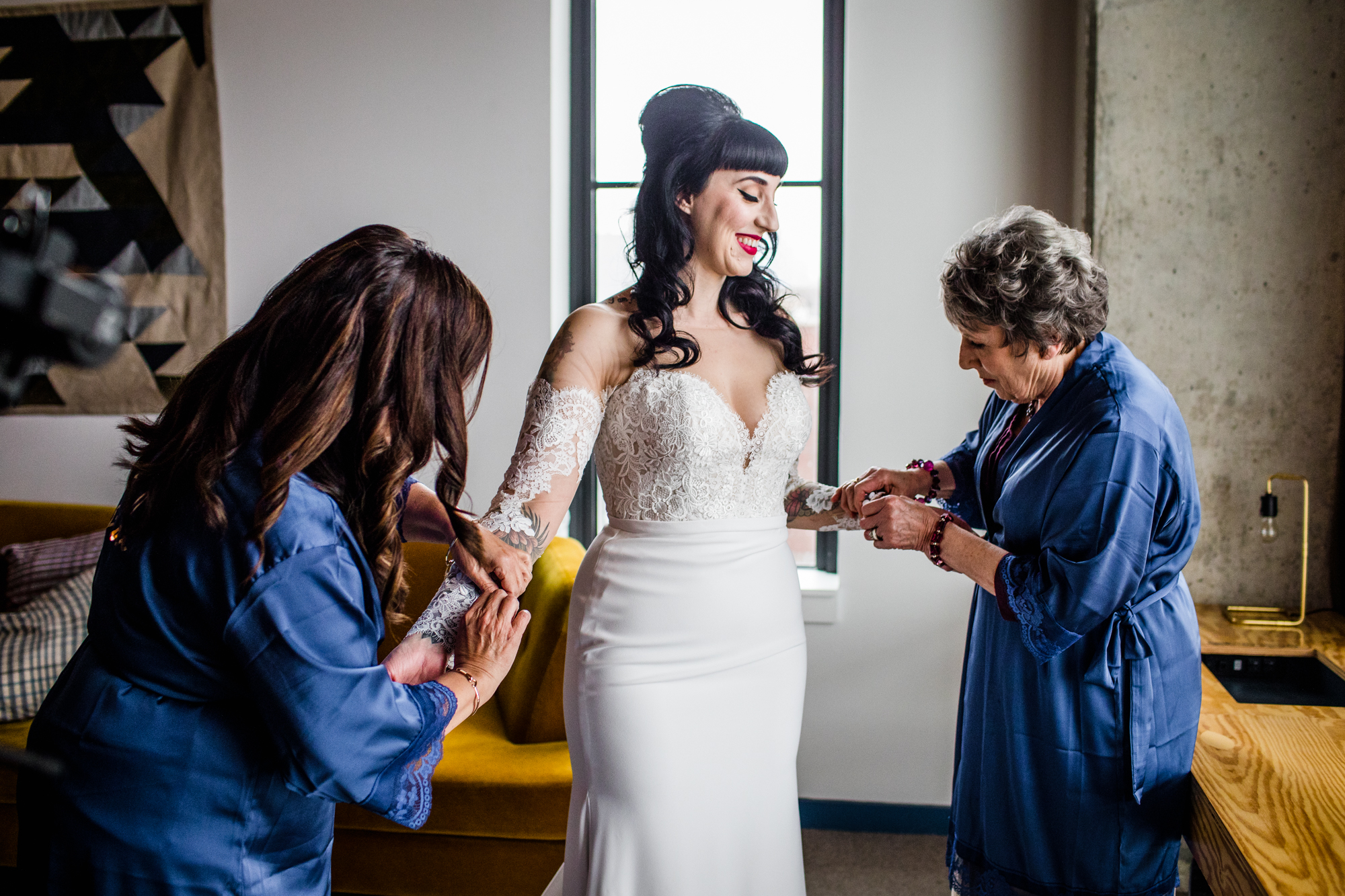 Family members help a bride get ready at the Ace Hotel. 