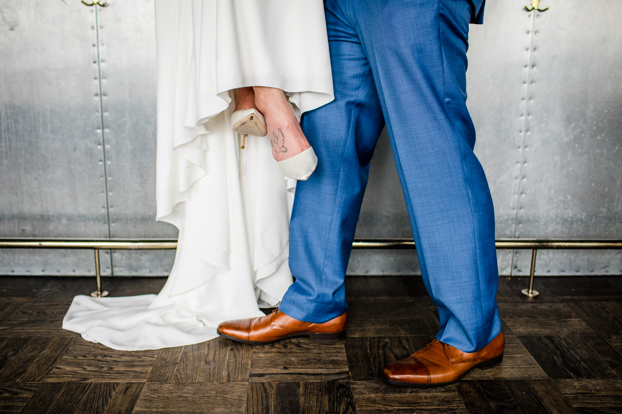 A close up of a couple's shoes during a wedding portrait shoot at the Ace Hotel in Chicago. 