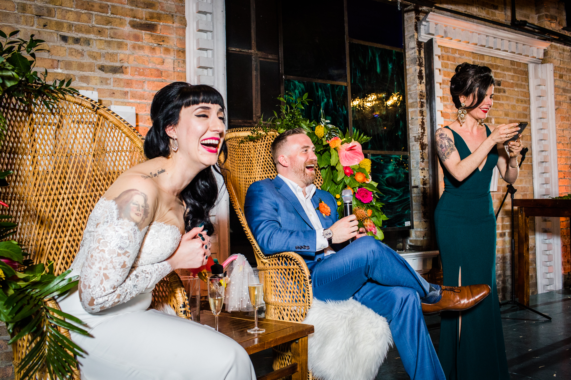A bride and groom react to a toast during a Salvage One wedding in Chicago. 