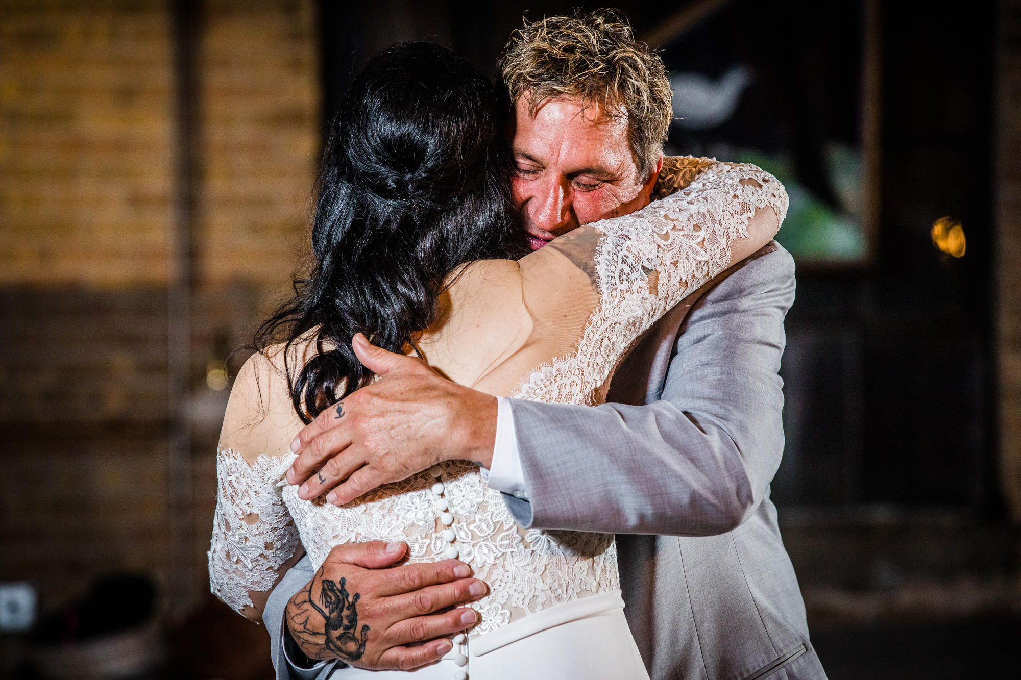 A bride shares her first dance with her dad at a Salvage One wedding reception. 