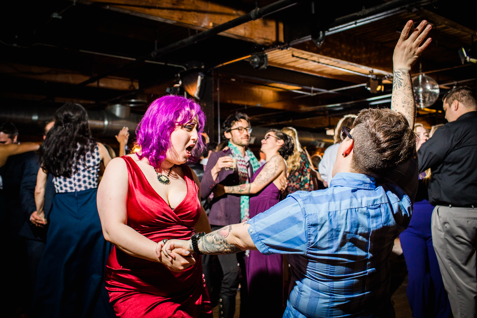 Guests dance at a Salvage One wedding reception. 