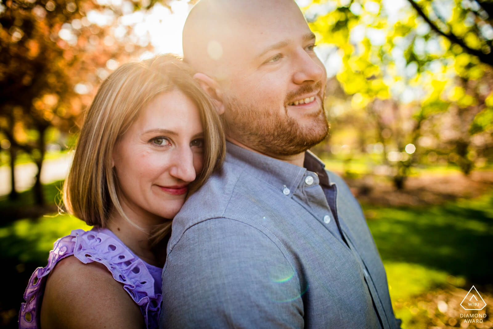 Close up of couple by Chicago engagement photographer in Wilder Park