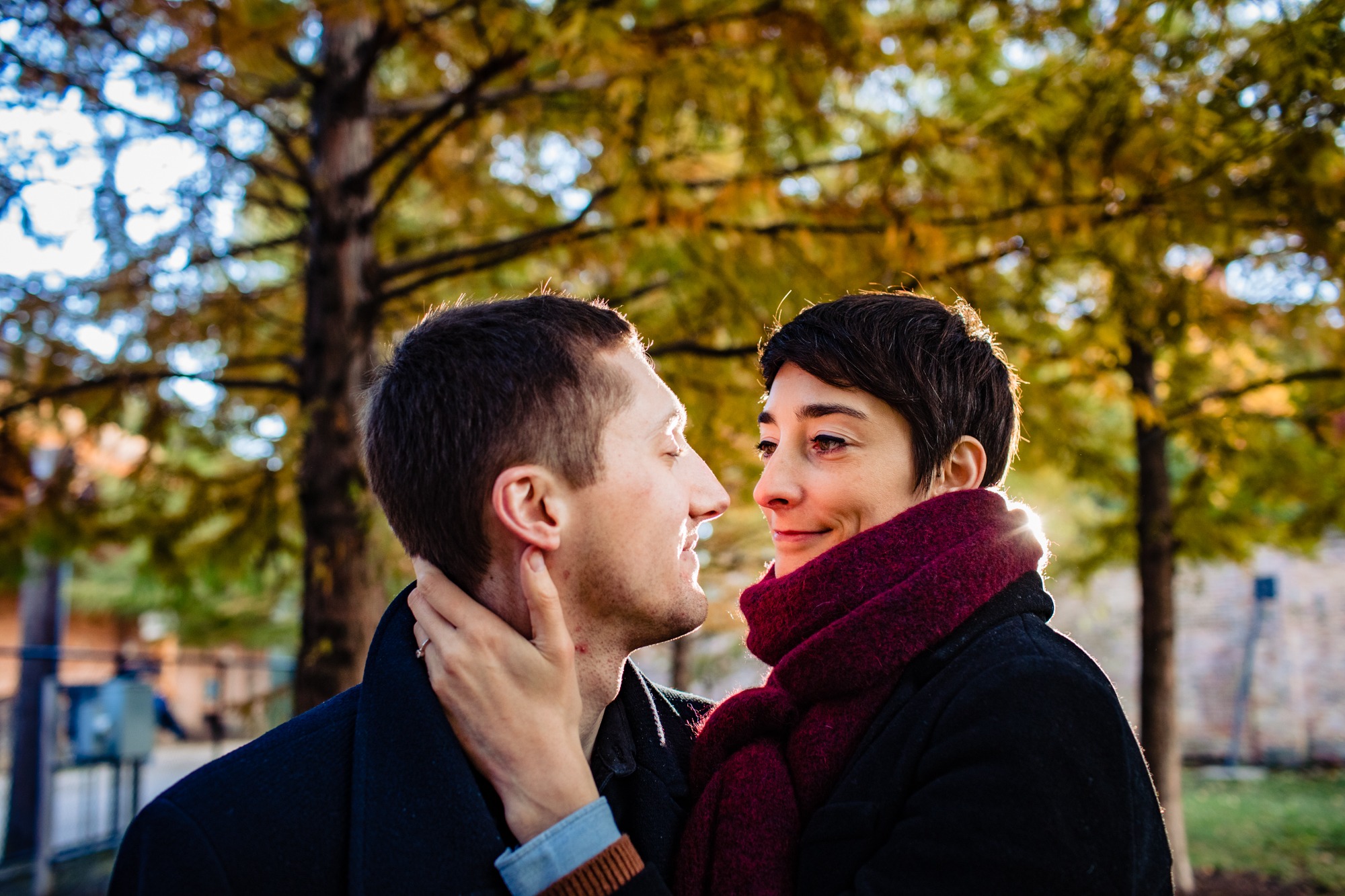A couple hugs each other during a Wicker Park engagement session.