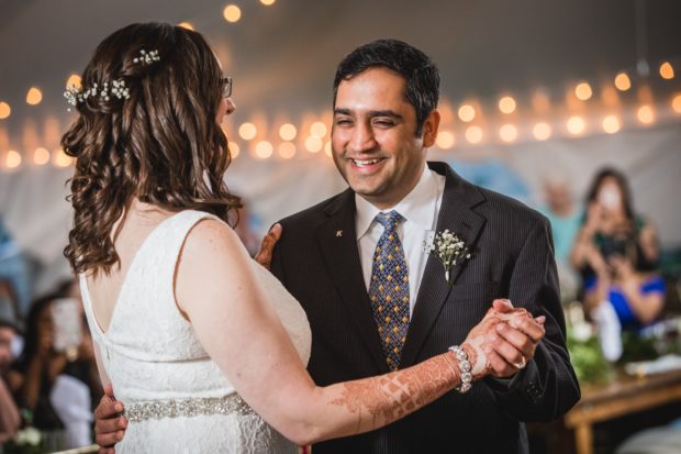 A couple shares their first dance at a backyard wedding in Yorkville, Illinois