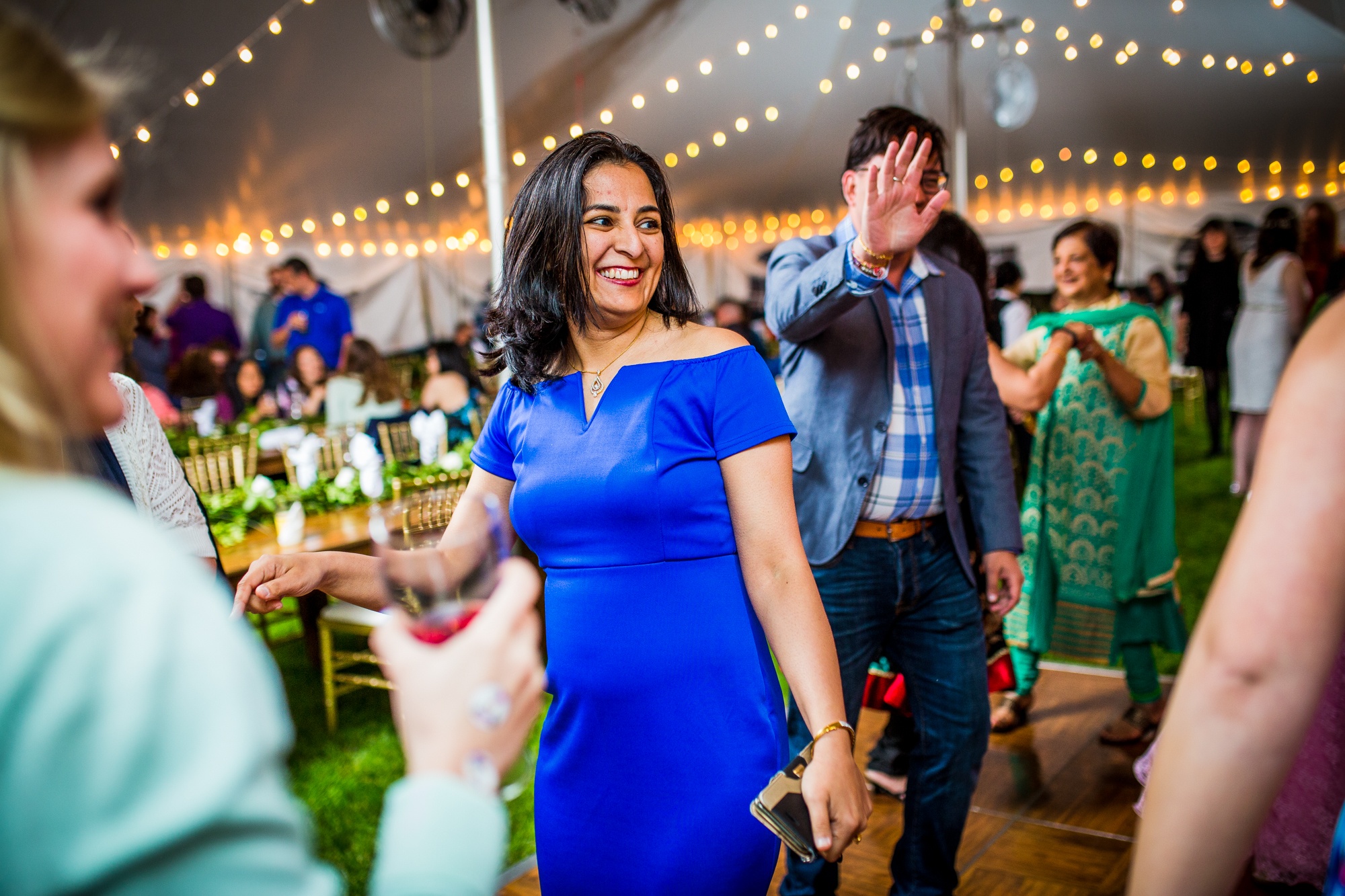 Guests dance together at a backyard wedding in Yorkville, Illinois