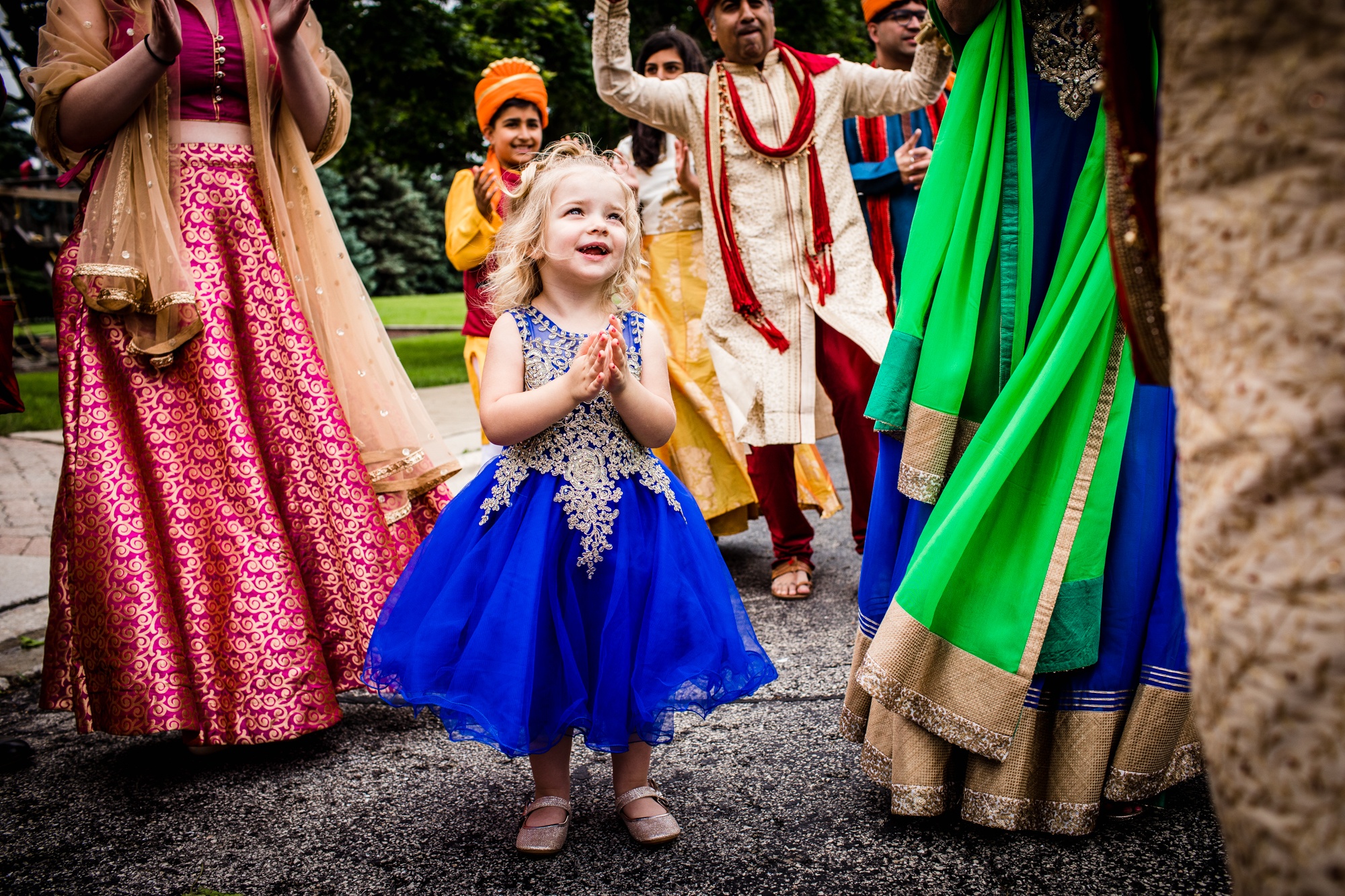 Guests dance at a baraat during an Aurora Balaji Temple wedding ceremony