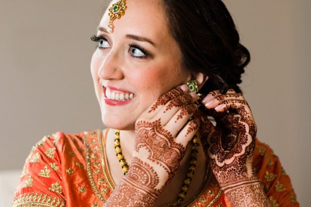 A bride gets ready before her Aurora Balaji Temple wedding