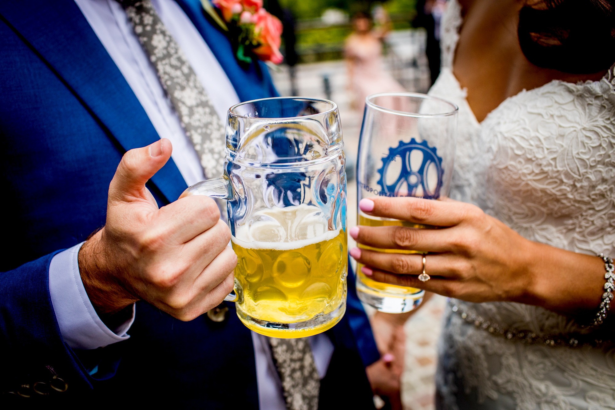 A couple toasts together at Metropolitan Brewing before their Chicago wedding 