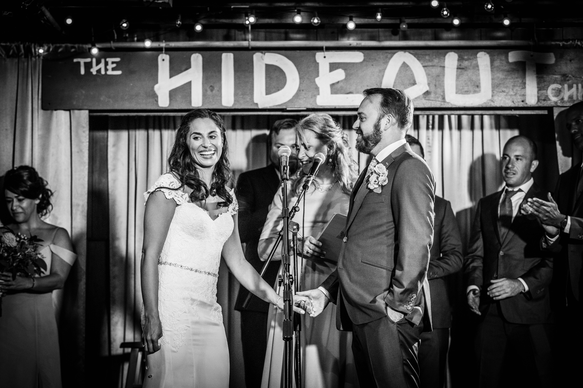 A couple laughs together during a Hideout Chicago wedding ceremony