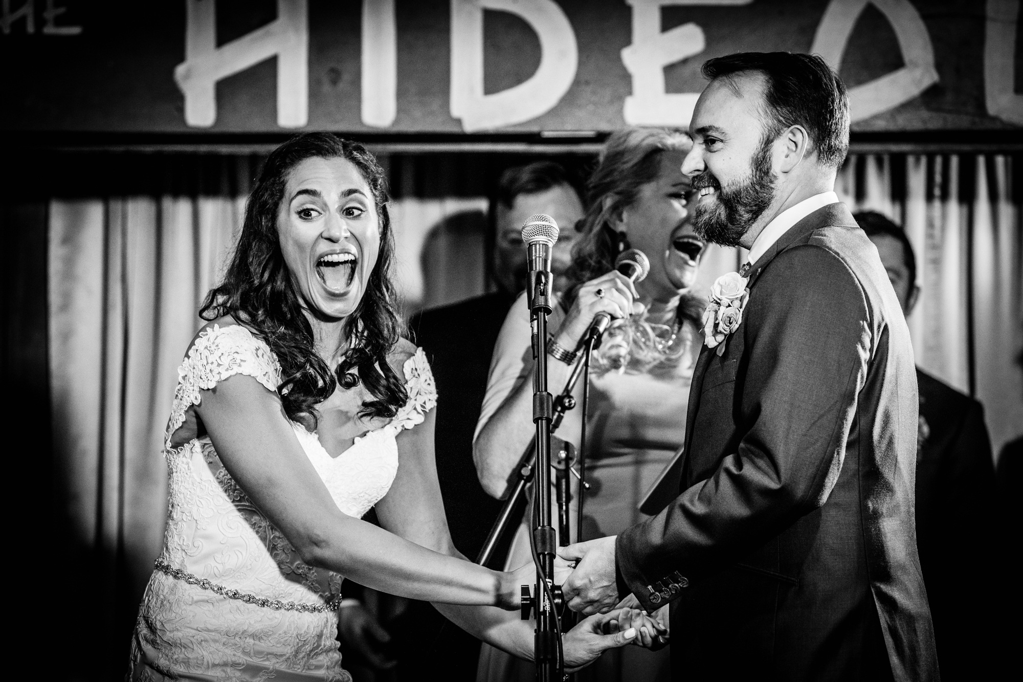 A bride laughs during a Hideout Chicago wedding ceremony