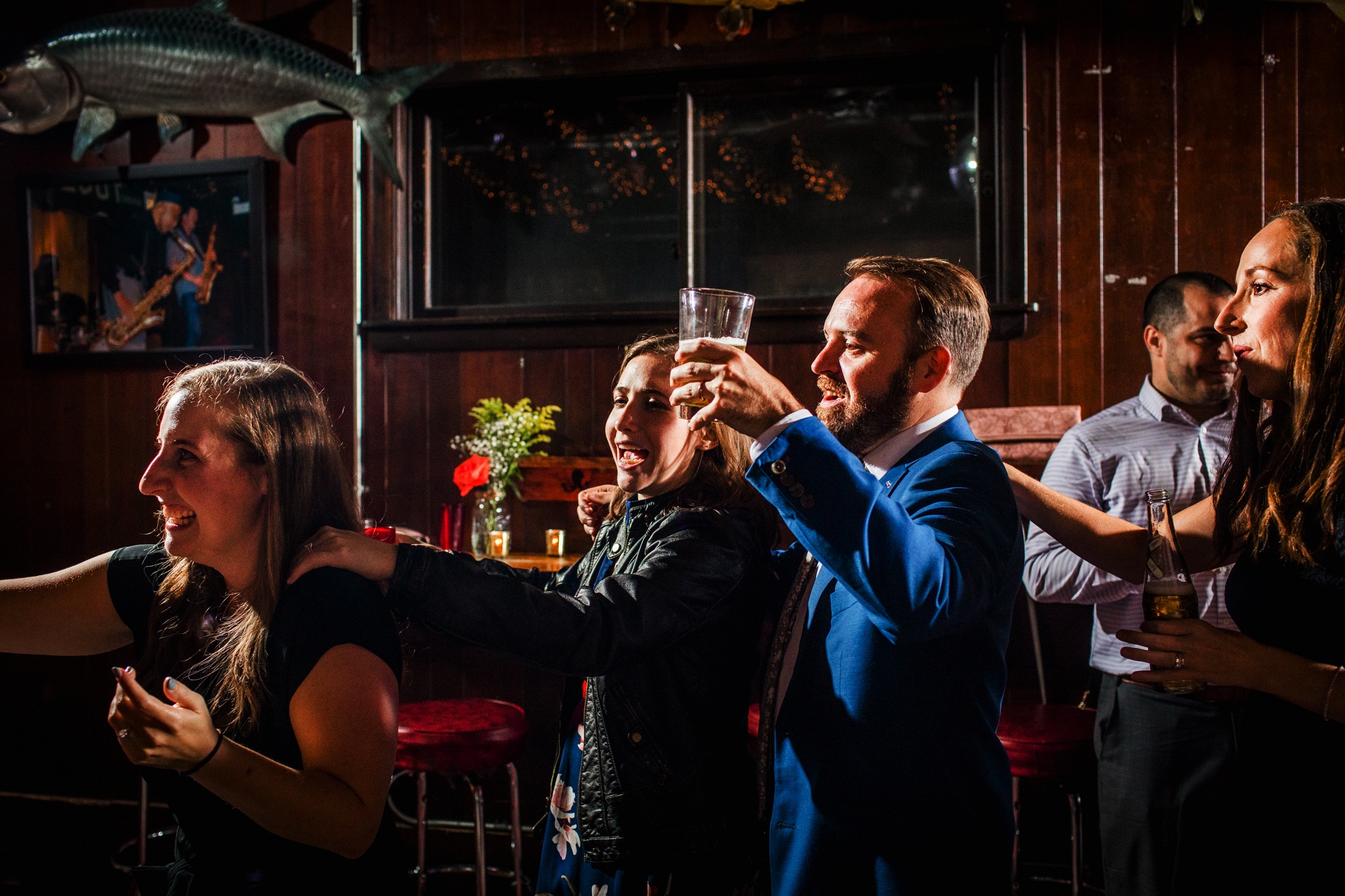 A groom dances with guests during a Hideout Chicago wedding reception