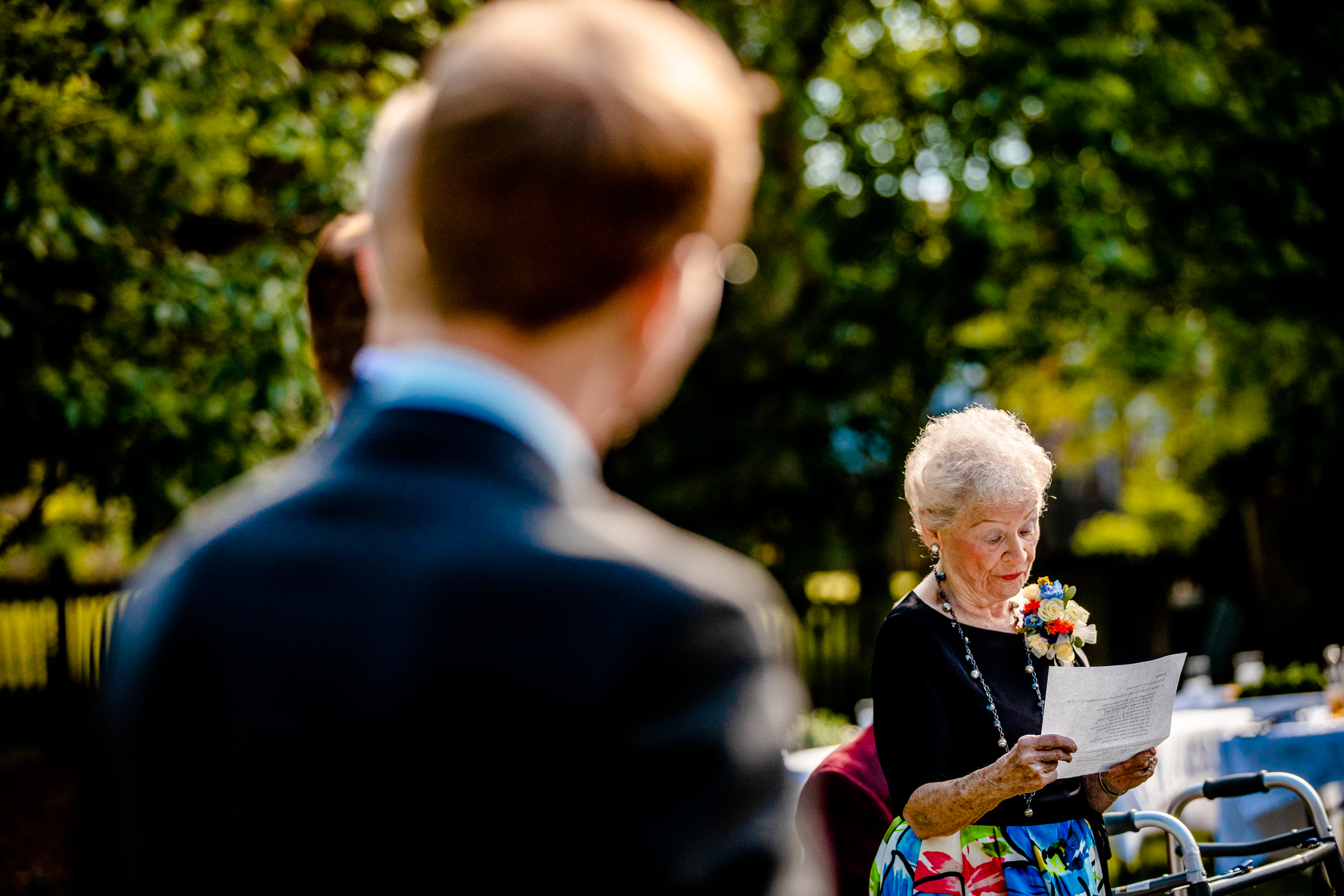 A grandmother gives a reading during a Naperville micro wedding.