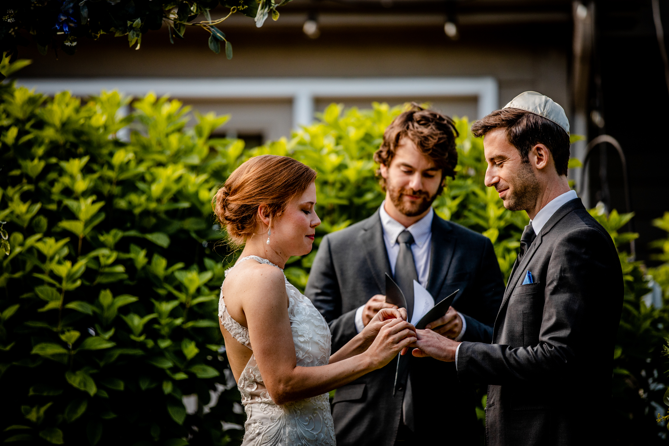 A couple exchanges rings during a Naperville micro wedding.