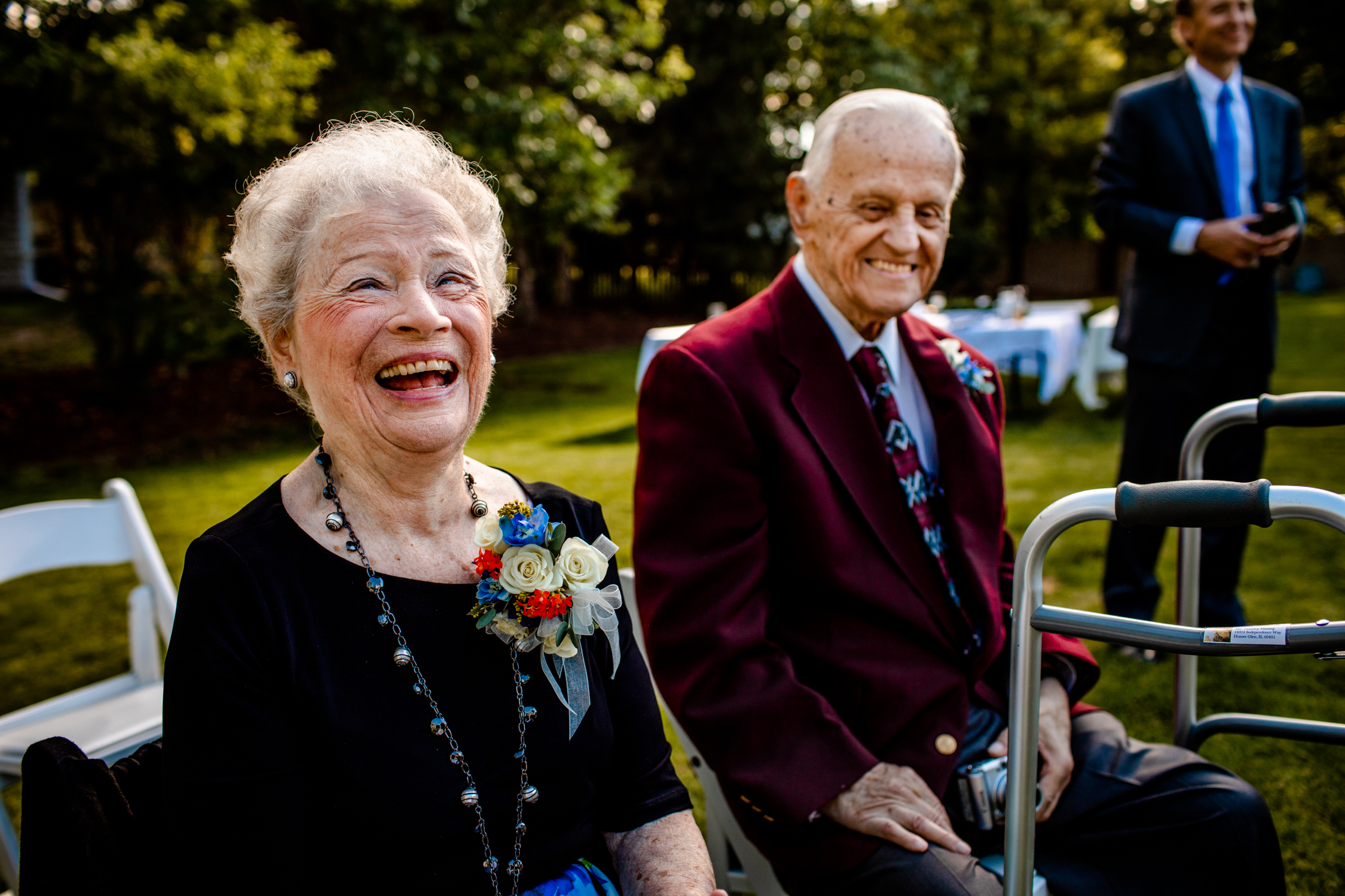 Grandparents laugh together during a Naperville micro wedding.