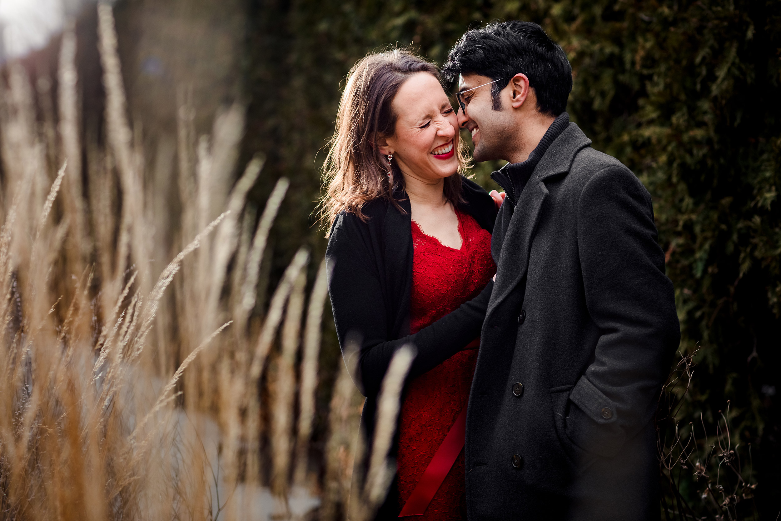 A couple laughs together in Lurie Gardens during an elopement in downtown Chicago.