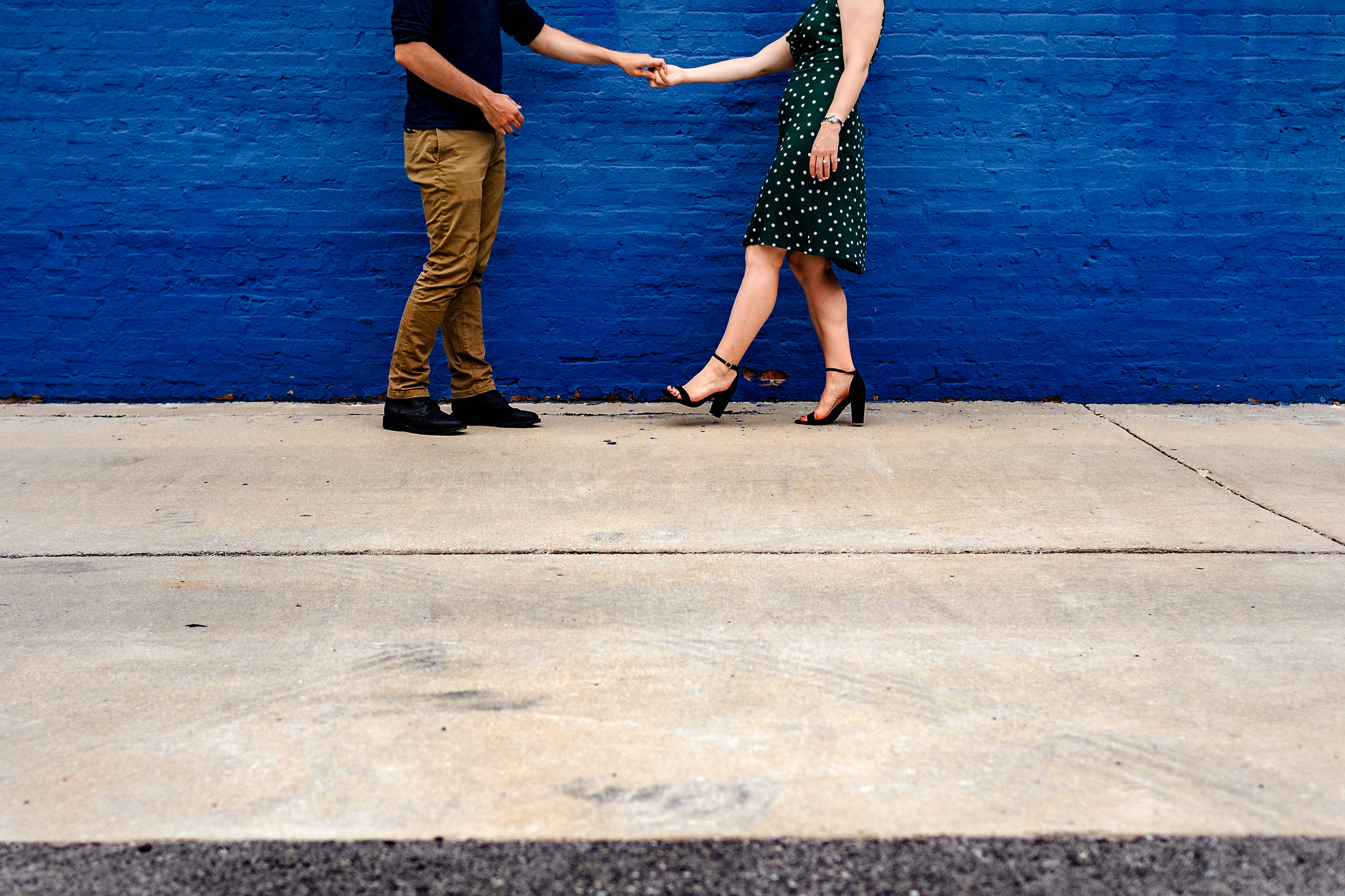 A couple dances together during a West Loop engagement session.