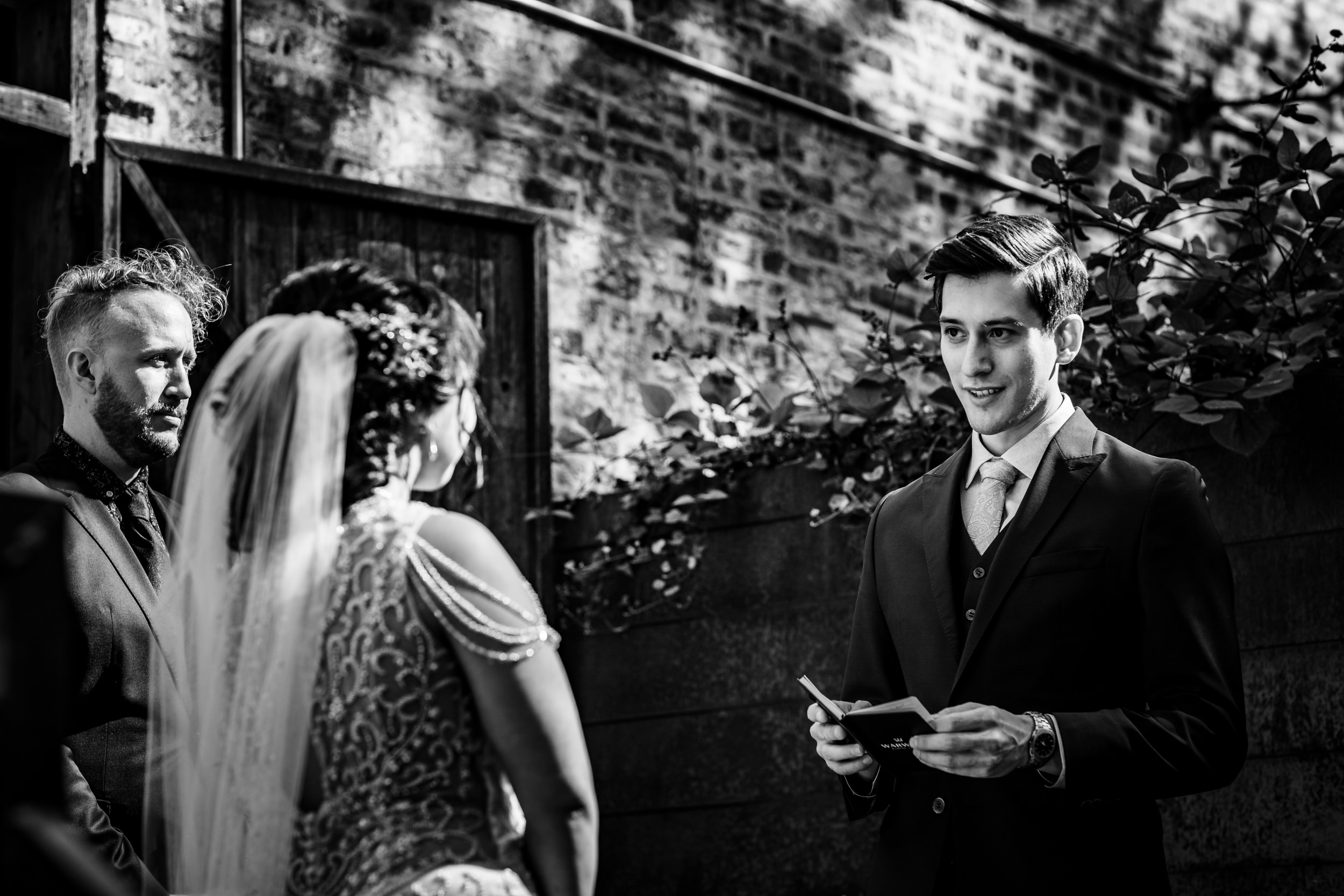 A groom shares his views during a wedding at the Joinery in Chicago.