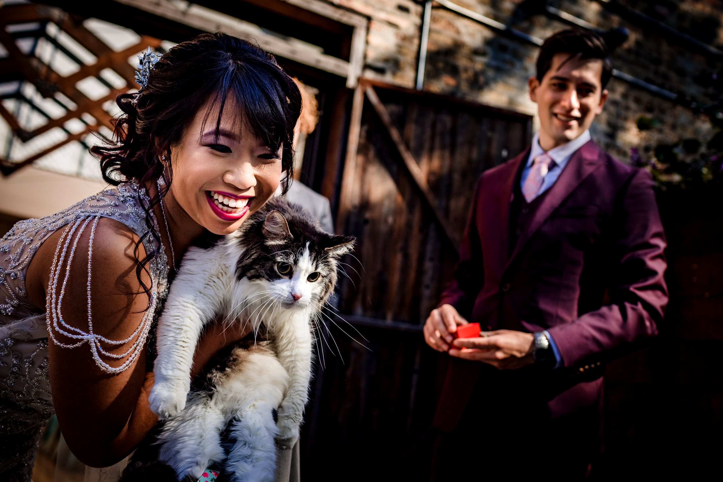 A bride holds her cat during a wedding ceremony at the Joinery in Chicago.