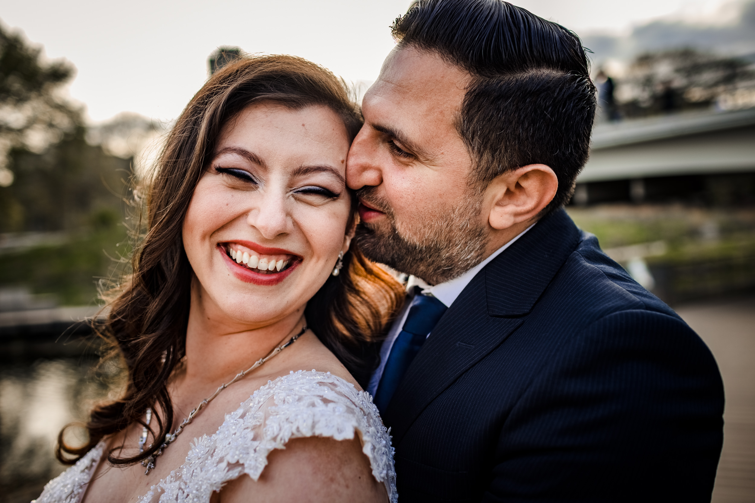 A couple laughs together during a Lincoln Park elopement in Chicago.